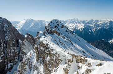 View from the top of the mountain in the heart of the Dolomites. Winter landscape with a great view