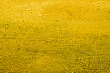 Yellow background. Texture. Metal painted in yellow.