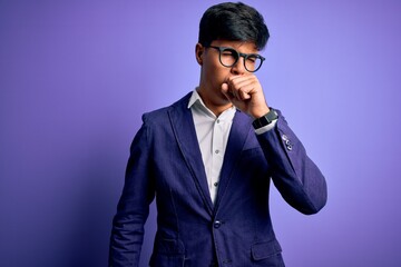 Young handsome business man wearing jacket and glasses over isolated purple background feeling unwell and coughing as symptom for cold or bronchitis. Health care concept.