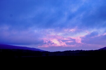 Obraz premium time lapse of clouds at sunset