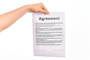 Holding agreement paper over isolated white background