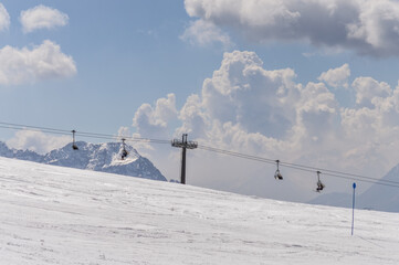 Dolomites Alps mountains in spring with cable car in Italy, Madonna di Campiglio TN
