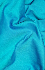 crinkled blue fabric with visible texture