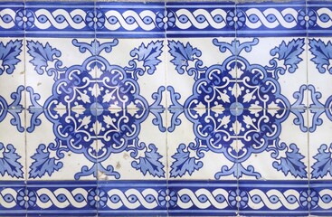 Traditional portuguese azulejo tiles with blue, turquoise and white decoration