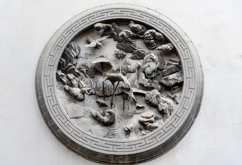 The relief sculpture of Dinghui Temple in Suzhou, Jiangsu Province, China