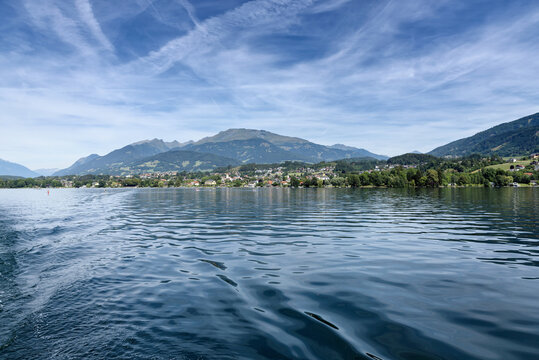 View over dark blue water of Lake Millstatt to Seeboden am Millstaetter See, Carinthia, Austria