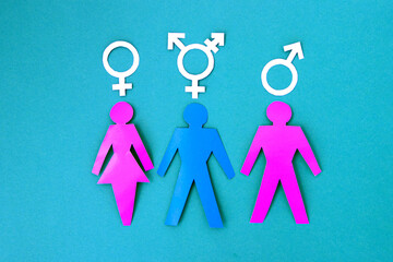 paper figures of people with different genders.