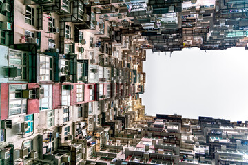 The popular between tourists place called Montane Mansion near to Tai Koo in Hong Kong. Overcrowded old retro building