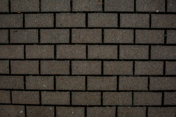 Сoncrete dark tile withground. Black concrete background
