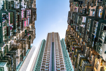 The popular between tourists place called Montane Mansion near to Tai Koo in Hong Kong. Overcrowded old retro building