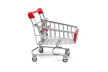 Empty aluminum shopping trolley close up shot on a white background.