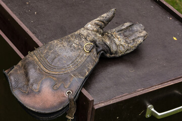 Heavily worn falconry Gauntlets.