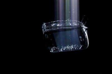 Smartphone splashing in water