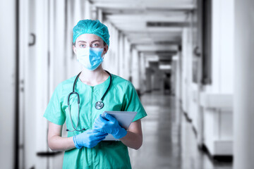 Coronavirus surgical mask doctor with stethoscope wearing face protective mask against coronavirus...