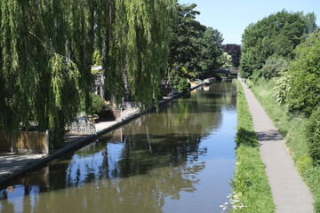 Fototapeta na wymiar Canal tow path walk in trees
