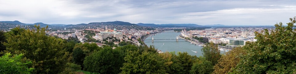 Fototapeta na wymiar Panoramic view of the city of Budapest from the Citadel on Mount Gellert where you can see the Buda Castle or the Chain Bridge among others, Budapest, Hungary