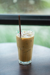 Iced coffee resting on the table background blurred