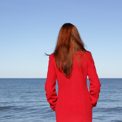 Girl on the seashore
The girl looks at the sea. Girl at the sea with long hair