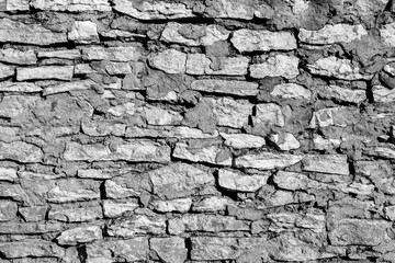 old wall made of limestone. texture or background