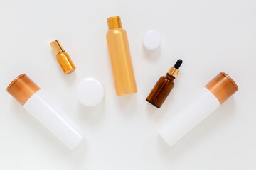 Cosmetic bottles set on the white background