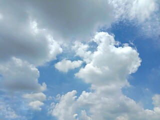 Blue skies and clouds backgrounds and textures closeup for wallpaper interior design. In Nakhon Pathom, Thailand.