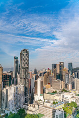 The amazing view of Hong-Kong cityscape full of skyscrapers from the rooftop.