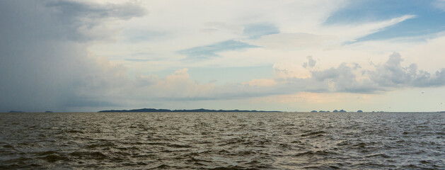 Brown colored lagoon with beautiful sky in Thailand