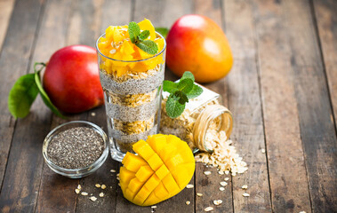 Healthy chia seed pudding with mango and granola