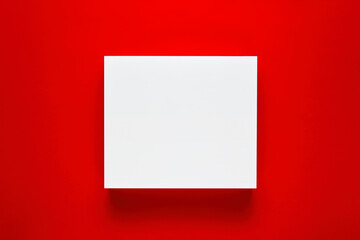 White blank square shape or frame on red background