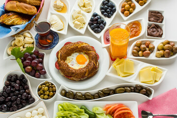 Traditional Turkish breakfast on the white surface with special cooked crunchy bagel 