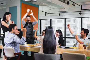 business team celebrate together in office, teamwork success win strategie meeting table