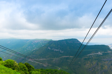 Fototapeta na wymiar Mountains of Armenia from the cable car from Tatev Monastery on a summer day