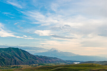 landscape of Armenia - Mount Big Ararat with a snow-capped peak in the evening