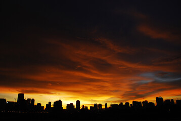 Fototapeta na wymiar Beautiful sunset City in silhouette