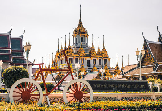 Feeding Fish from the Boat on Chao Phraya River in Bangkok, Thailand