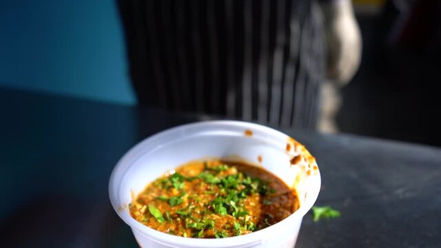 Sprinkle Coriander on Food in Restaurant