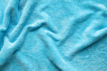 Blue towel fabric texture surface close up background