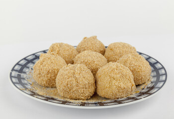dumplings with plums on a plate