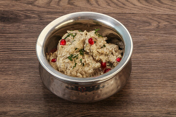 Vagan dietary cusine - mutabal with granet seeds