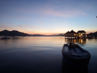 Coron, province of Palawan, Philippines. An amazing sunset from Coron port. Coron Island Natural Biotic Area is listed in the natural category fo the UNESCO World Heritage Tentative list