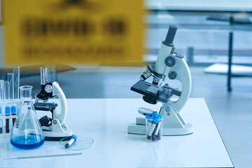 close up of blood test sample in test tube of the patient under investigation of corona virus COVID-19 infection  in science laboratory