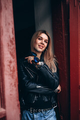 Portrait of a young girl. Photo session of a stylish girl outdoors.
