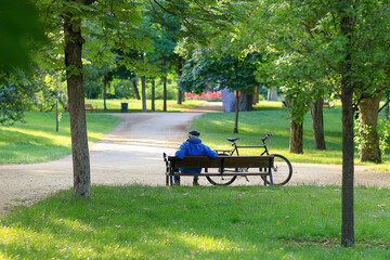 Old man on a bench .