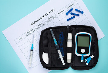 Daily blood glucose log with sugar or insulin checking measurement set on light blue background top...