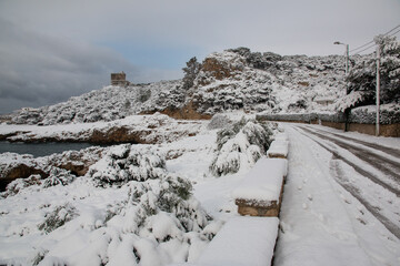 Ionian coast after a exceptional snowfall, Salento, Italy