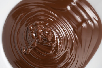 poured melted dark chcolate background closeup