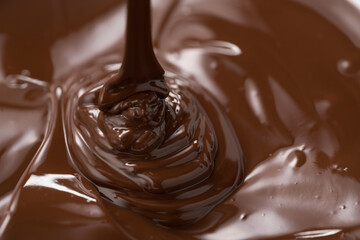 poured melted dark chcolate background closeup