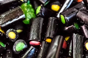 black tasty pile of gummy sweets