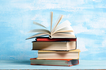 Books on wooden desk table and abstract background. Education background. Copy Space. Back to school.