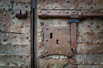 Keyhole of an old rusty door of the Torre del Oro (Gold Tower) in Seville, Andalusia, Spain
